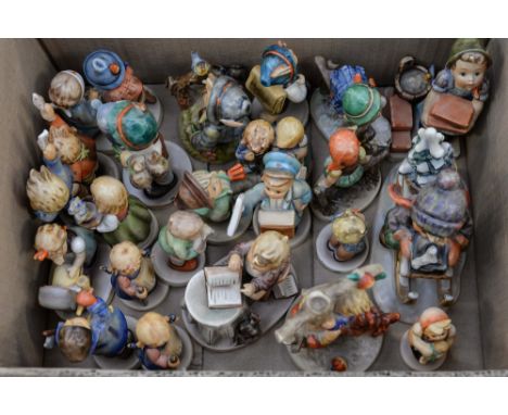 A box of over twenty Goebel Hummel figures