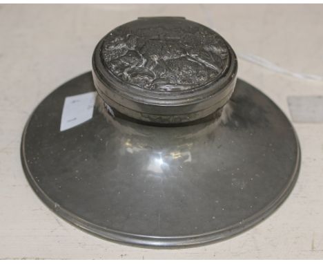 A Cornish pewter capstsan inkwell, the lid cut with hunting dog in landscape