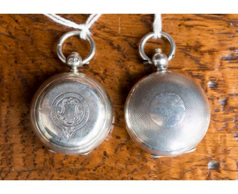 An Edwardian silver sovereign case of ovoid form with engine turned decoration, hallmarked for Albert Jackson, Birmingham 190