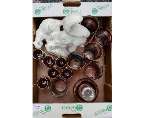 A set of six ruby and gold glass drinking and sherry glasses with matching decanter and a creamware Rowntree's Squirrels grou