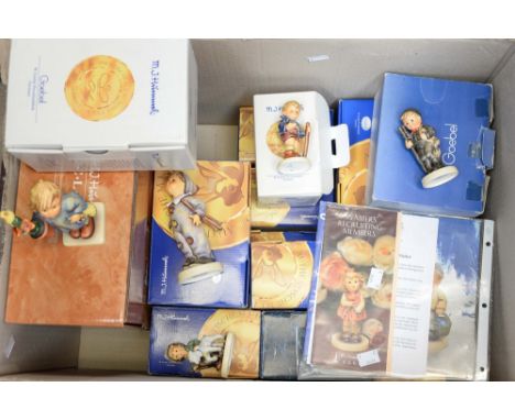 A collection of boxed Goebel Hummel, some boxed collectors' club 