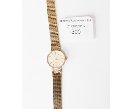 A ladies' Tissot 9ct gold bracelet watch 
