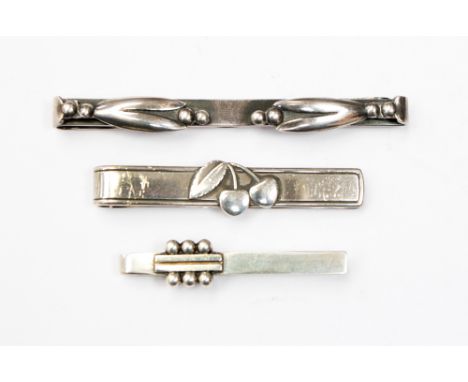 George Jenson silver tie clips and a Hans Jenson tie clip, Danish (3)