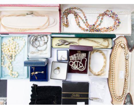 A collection of costume jewellery comprising simulated pearl necklaces, a Stratton compact, earrings, a silver ring, a silver