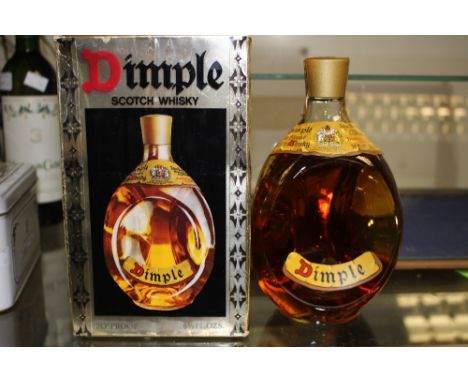 A boxed bottle of Dimple Scotch Whisky 
