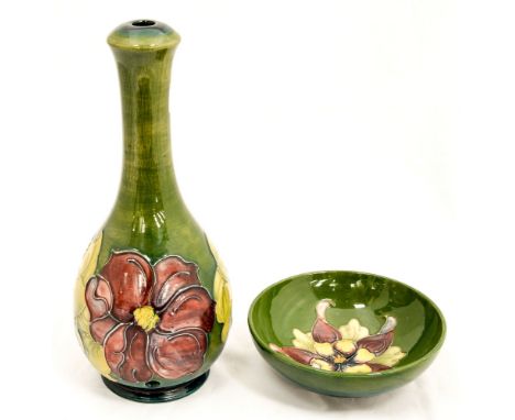 A Moorcroft lamp base, green ground, 'Hibiscus' pattern circa 1935, impressed Moorcroft together with a green ground bowl 'Pa