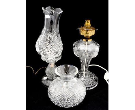 A cut glass oil lamp converted to electricity and another cut glass lamp (Waterford) (4 parts) 
