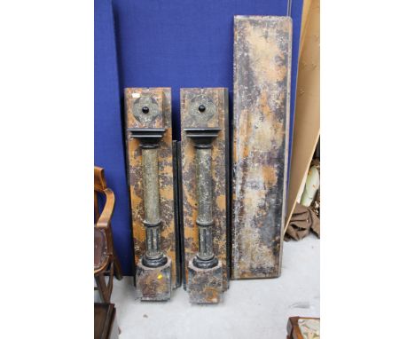 A Victorian slate iron fire surround, in three sections, the sides with turned columns