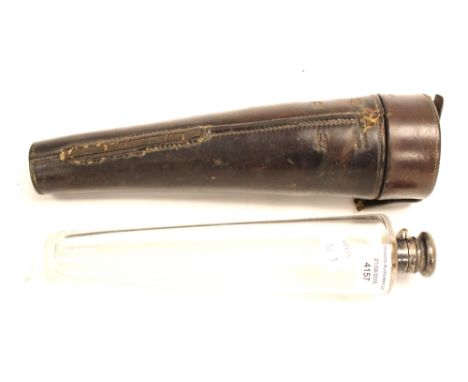 Hunting flask in leather carrier.