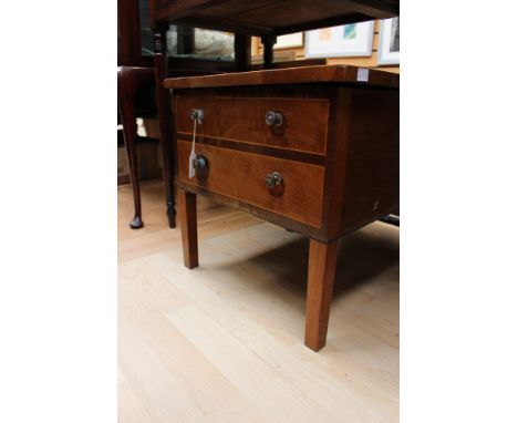 A George III mahogany commode, with faux drawers to front, the lid opening to reveal bowl support, raised on square tapered l