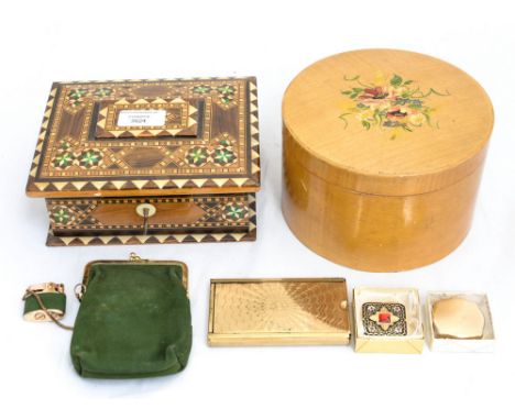 A Stratton pill box with another pill box a Stratton travelling clothes brush and a ladies' cigarette lighter and two jewelle