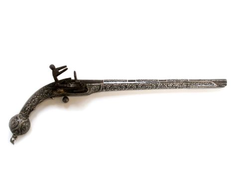 An antique mid to late 19th Century fine Caucasian miquelet pistol with a slender 60 bore barrel, rich silver ornate silver n