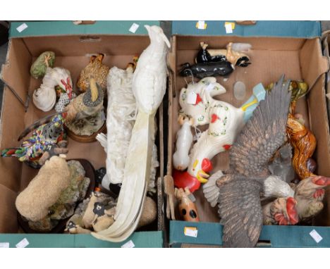 A collection of ceramic ockerels and farm animals, including Acorn Pigs, etc, French Pheasant sculpture and a life size cocke