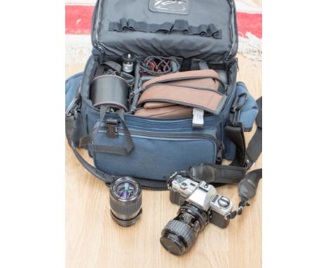 Minolta x300 camera with two lenses, 35-75mm and 60-200mm