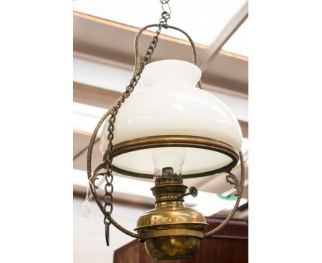 A Victorian copper hanging lamp with white glass shade, total hanging length approx. 130cms