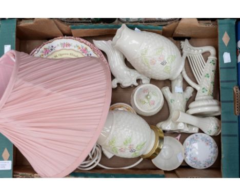 A quantity of Belleek to include lamp base and shade, jar and cover, lyre, vases, together with commemorative china etc