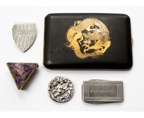 A 24ct gold decorated oriental cigarette case initials within an amethyst topped, Mexican silver box, two silver money clips 
