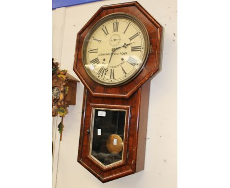 A late Victorian rosewood wall clock, J. Jenkinson and Sons, Retford, with pendulum