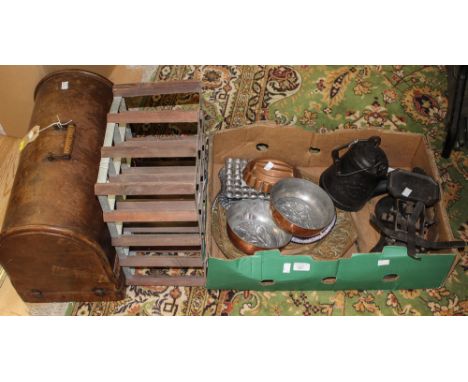 A cased sewing machine, wine rack and metalware, scales, oil can and Limoges 