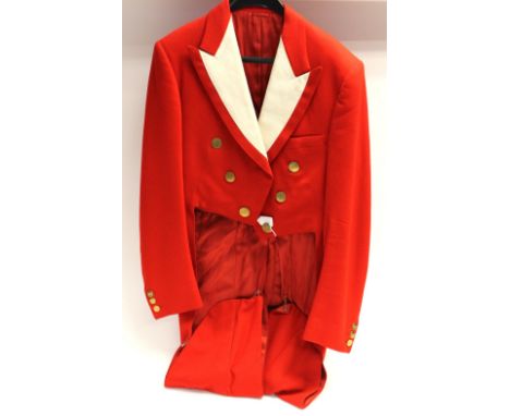 A red hunting tailcoat, with cream lapels, A.W.H. initials on buttons