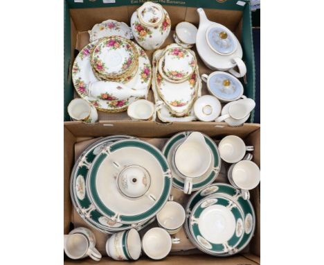 Two boxes of ceramics including Royal Albert 'Old Country Roses', a Royal Doulton 'Carlyle' blue pattern, three piece tea set