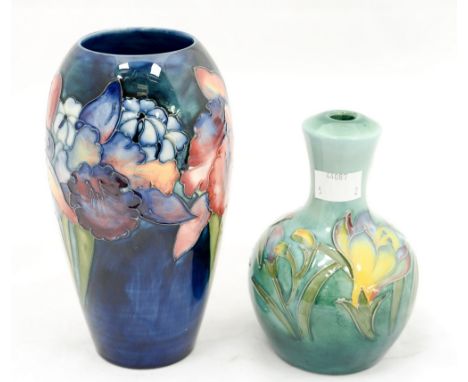 A Moorcroft 'Orchid' pattern ovoid vase on a blue ground, approx 18cm high, together with a small lamp base body (2)