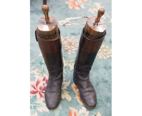 A pair of gents black and mahogany tops hunting boots with wooden trees, approx size 10