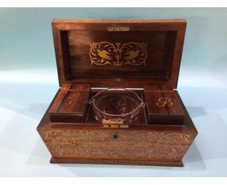 A brass inlaid tea caddy