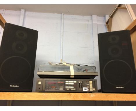 A shelf of Technics HiFi equipment