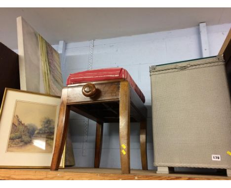 A shelf of assorted, to include prints, stool etc.