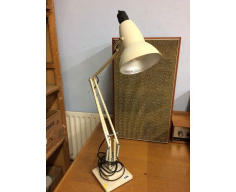 An angle poise lamp