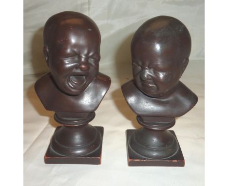 Pair of ceramic busts of crying babies