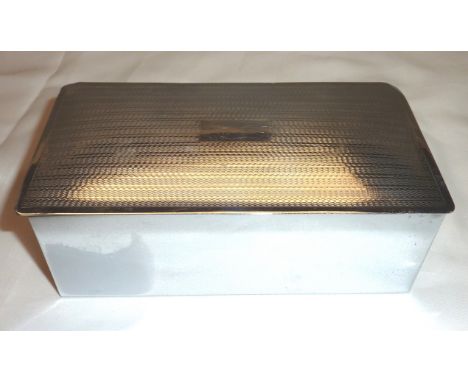 Silver plated and wood lined cigarette box with engine turned detail