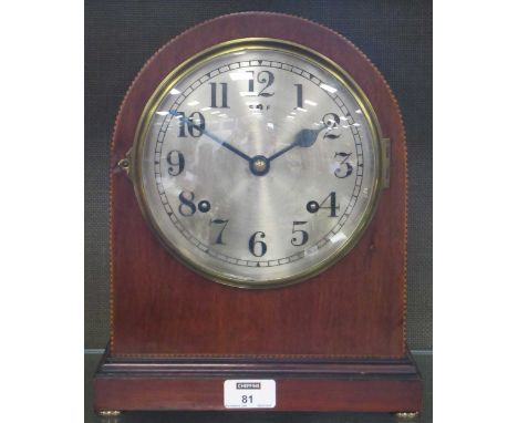 Wm. Gilbert clock Company, Winstead, Conn. USA, an Edwardian mahogany and inlaid arch topped striking mantel clock, 31cm high