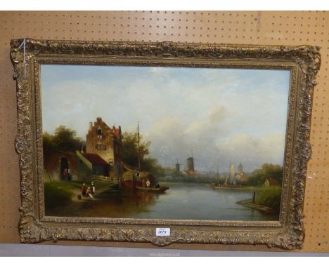 A gilt gesso framed Oil painting of a Dutch canal scene by Leon Arie Feyen very ably depicting a barge heavily laden with hay
