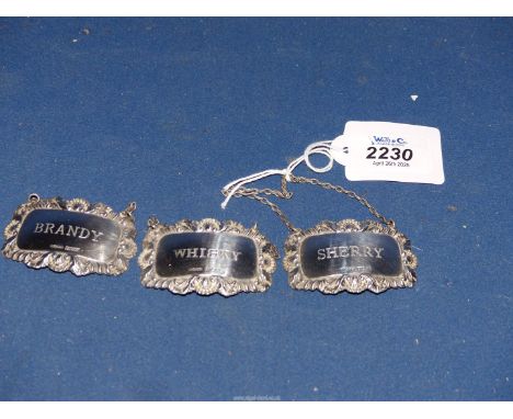 Three Silver decanter labels - Whisky, Brandy and Sherry, Birmingham 1970 and 1977.