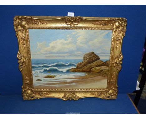 A gilt framed Oil on board depicting a seascape featuring a rocky coast and waves, signed lower right Peter Wood, 25 1/4" x 2