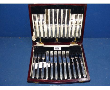 A cased set of Dessert Knives and Forks for 12 place setting, with silver handles, Sheffield 1928, maker William Hutton Ltd.