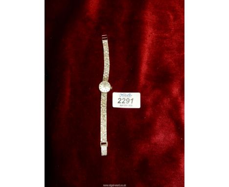 A ladies Tissot cocktail Watch on white gold bracelet strap, working at time of lotting (this lot is being sold in aid of Dor