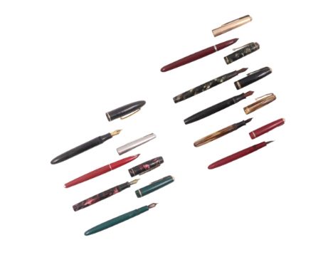 A group of vintage fountain pens including Parker Duofold, Waterman and Conway Stewart