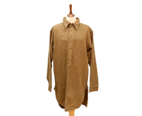 A 1945 dated British Army collar-attached half front opening shirt