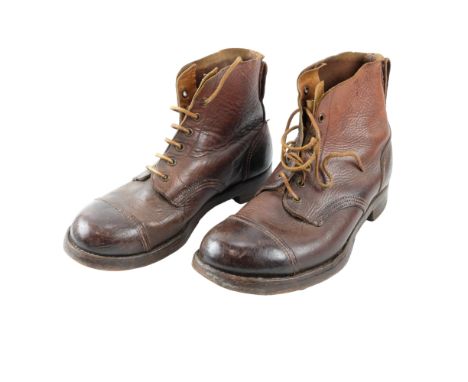 A pair of 1945 dated British Army jungle boots, size 7
