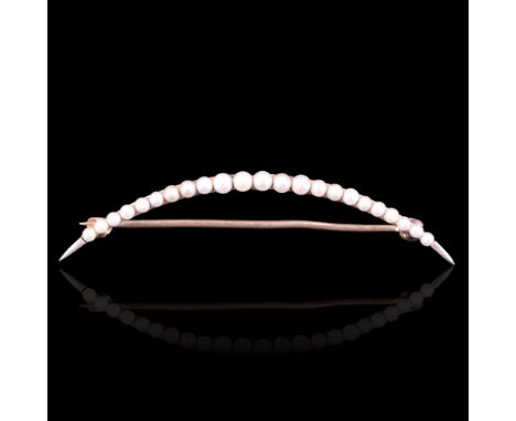 A late Victorian seed pearl crescent brooch, being a graded arrangement of pearls of mounted on a 14 ct gold blade bar, 54 mm