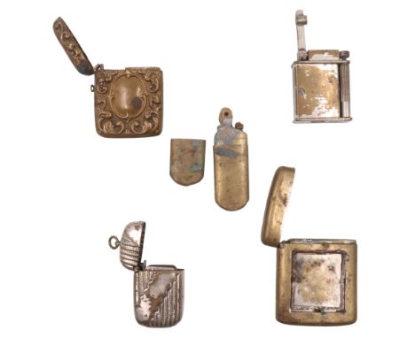 Three late 19th / early 20th Century Vesta cases together with a Hart and one other cigarette lighter