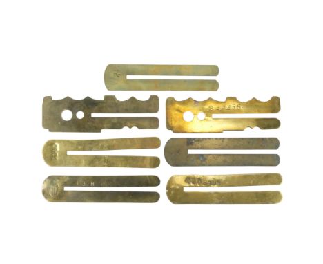  A collection of seven Great War - Second World War British Army unit-marked / service-numbered button sticks / clothing prot