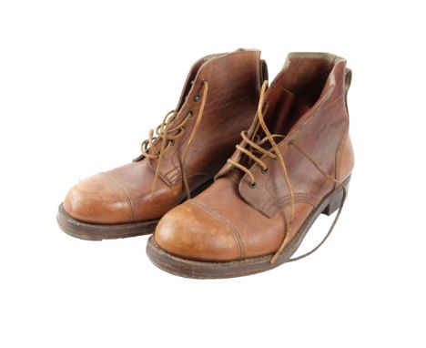 A pair of 1945 dated British Army jungle boots, size 8