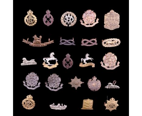 A small group of British army collar badges