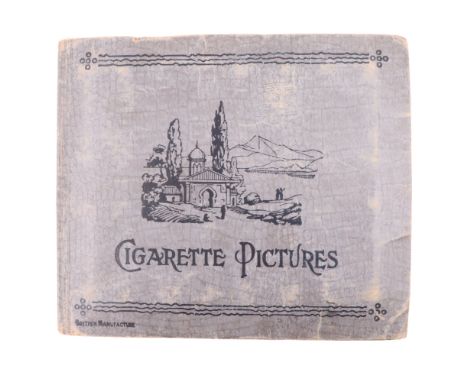 An album of vintage cigarette cards including Wills's "Life in the Treetops"