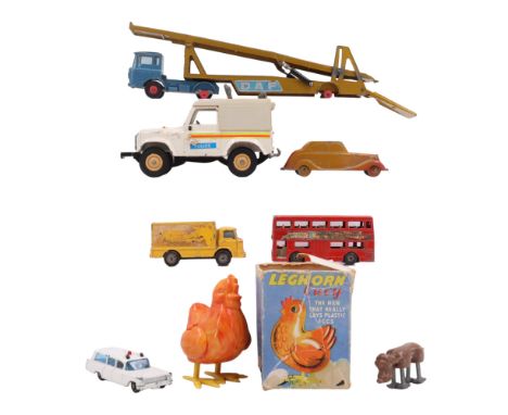 A group of vintage toys including a Tudor Rose "Leghorn Lucy" laying hen, a 1950s Disney Pluto walking ramp toy and a Britain
