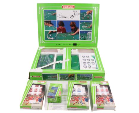 A Subbuteo table football game together with extra teams etc